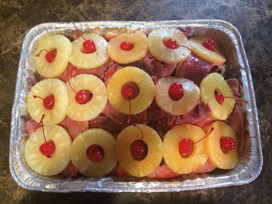 Jamon con Pina (Glazed ham with pineapples)